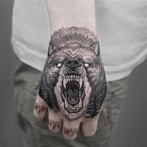 bear hand tattoo